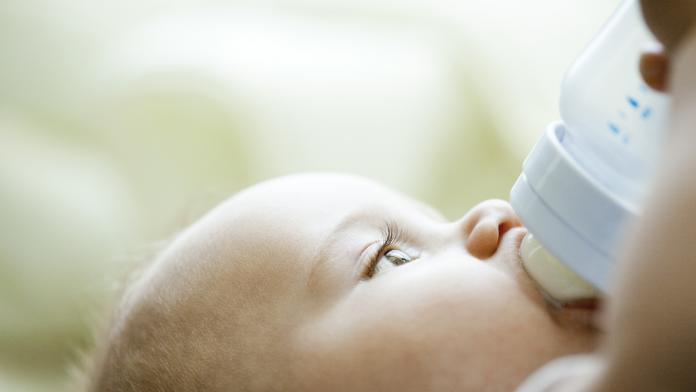 Baby drinking from bottle