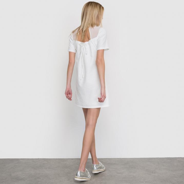 Witte jurk met transparante details