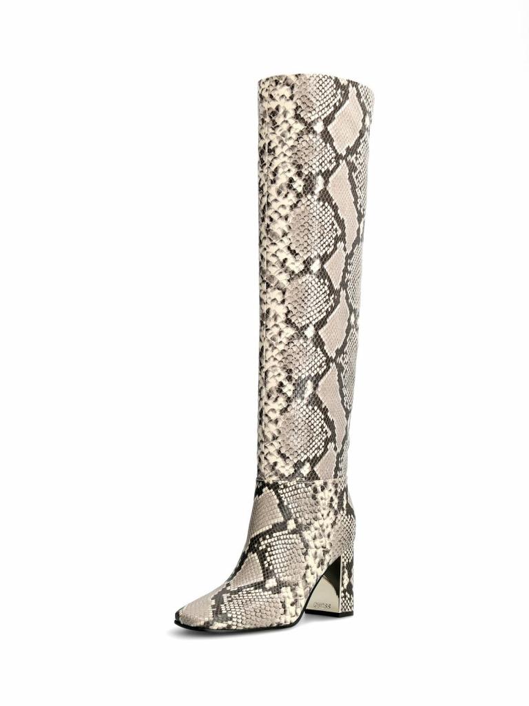 Hoge laars met pythonmotief (199 euro), van Guess.