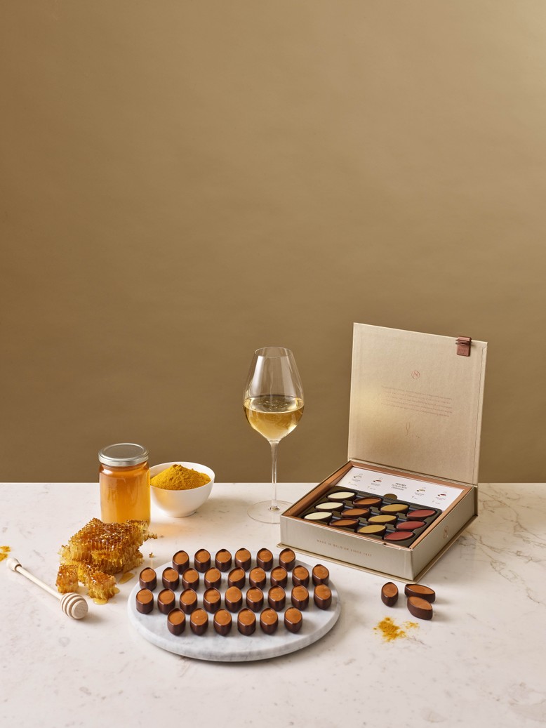 Neuhaus sort des pralines à déguster avec du champagne